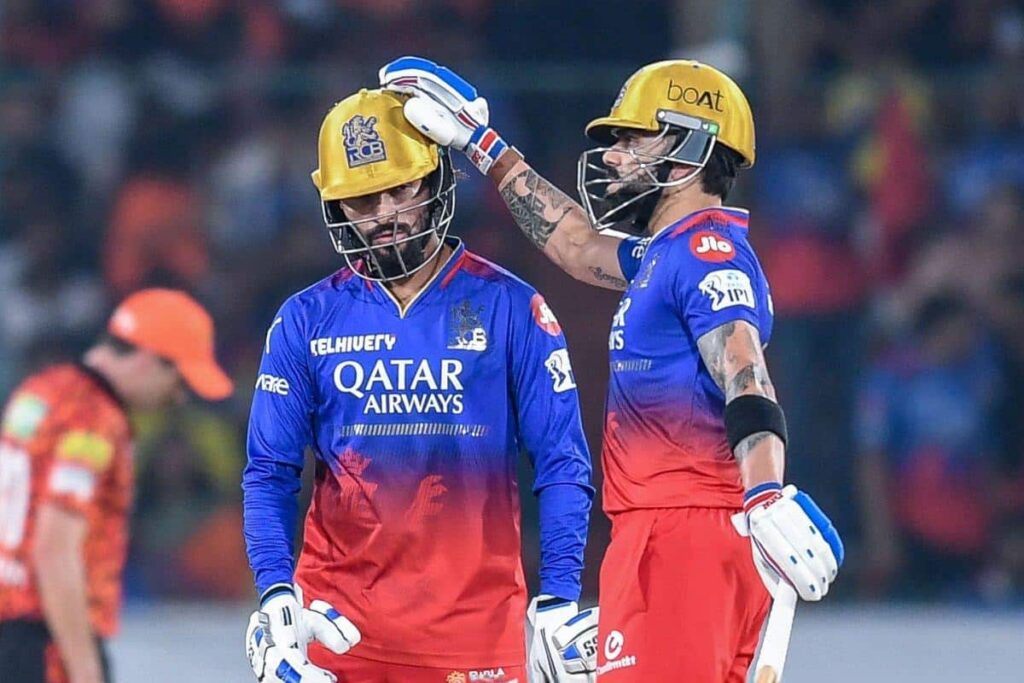 Ee Sala Cup Namde! RCB Finally Lifts the IPL Trophy 2025 – ReadEasyNews 6 Royal Challengers Bengalurus Rajat Patidar celebrates with his teammate Virat Kohli